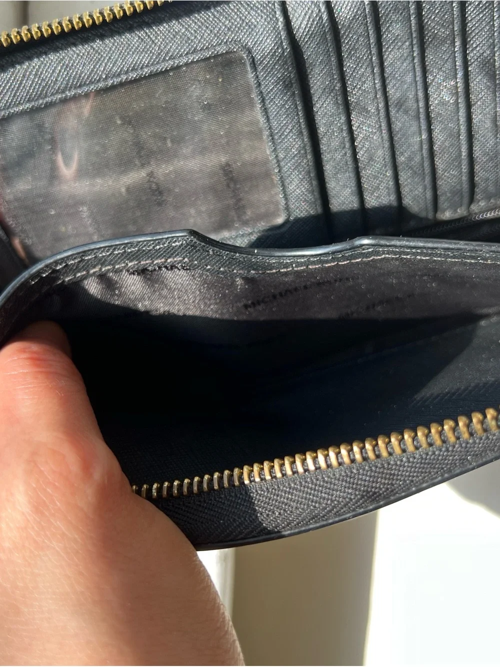 Michael Kors Black Saffiano Zip Wallet with Gold Logo